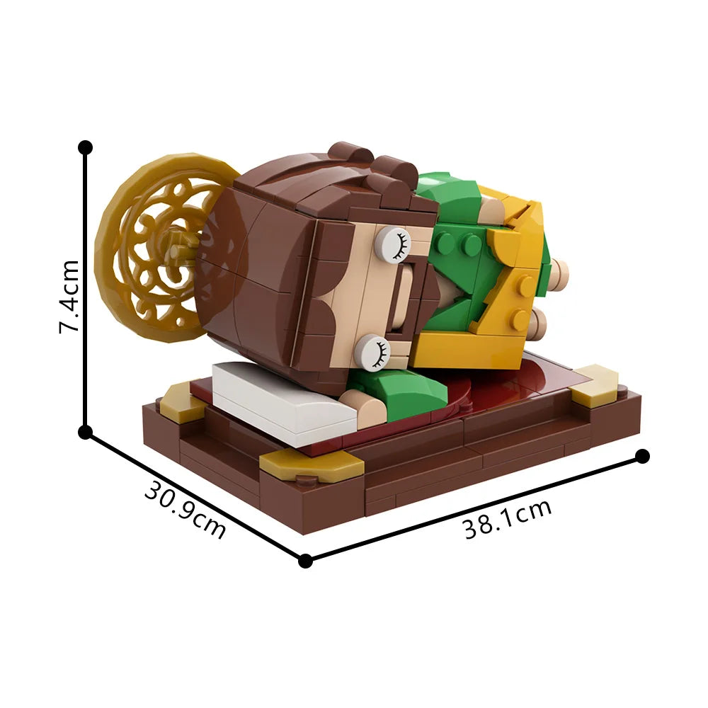 A peça com as medidas: 38,1 cm de comprimento por 30,9 cm e 7,4 cm de altura