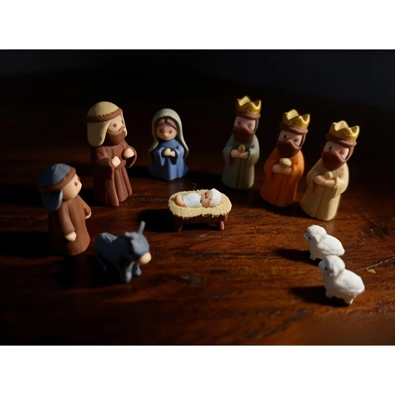 As figuras do presépio fora da lata, fundo branco
